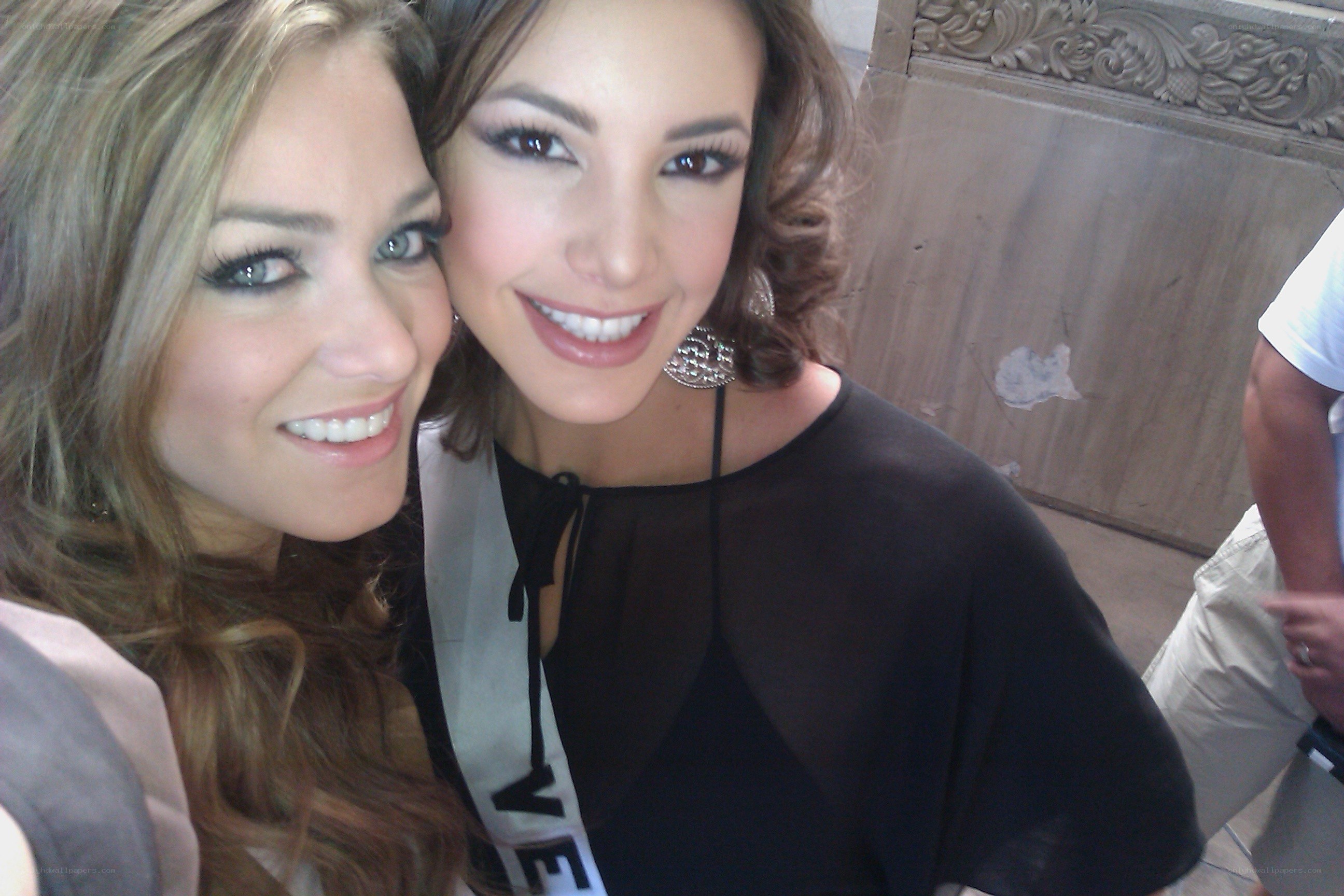 two women smiling together