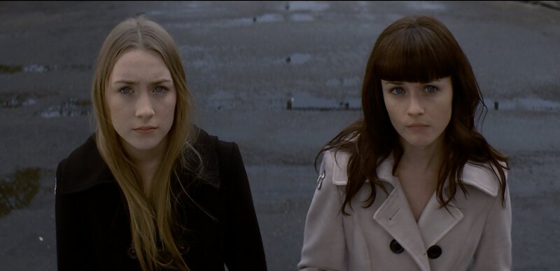 Two Women Standing — Gray, Serious