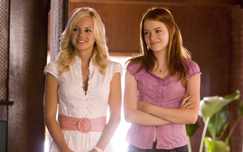 Two women standing together