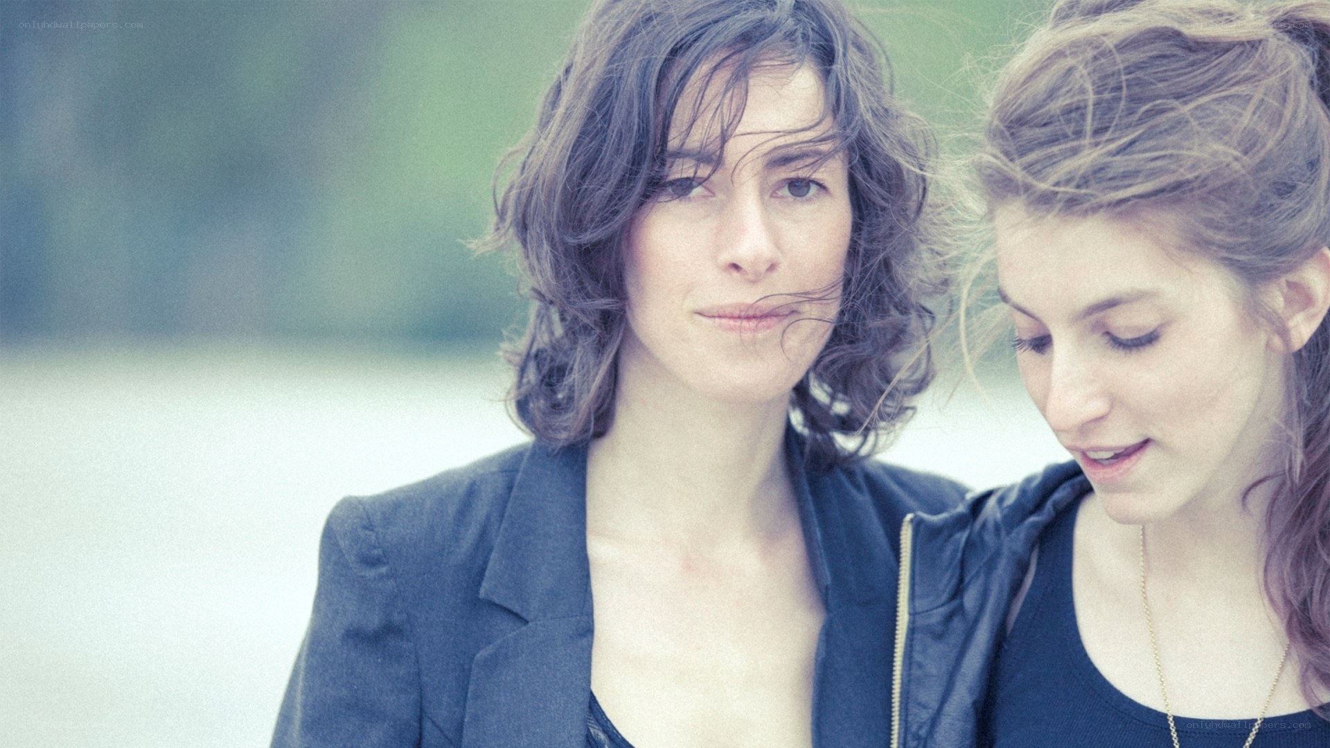 Two women standing together
