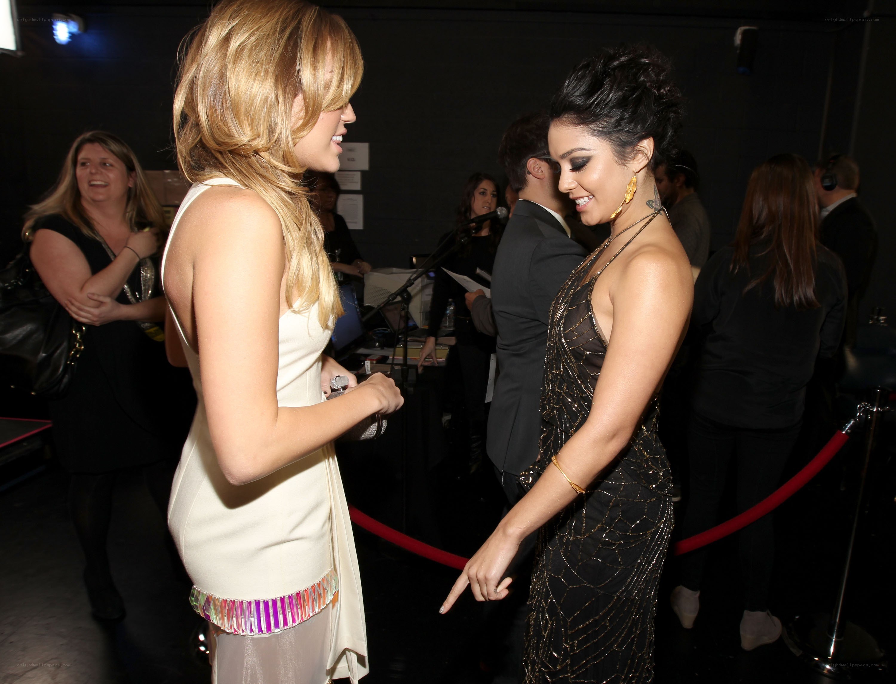 Two women talking at an event