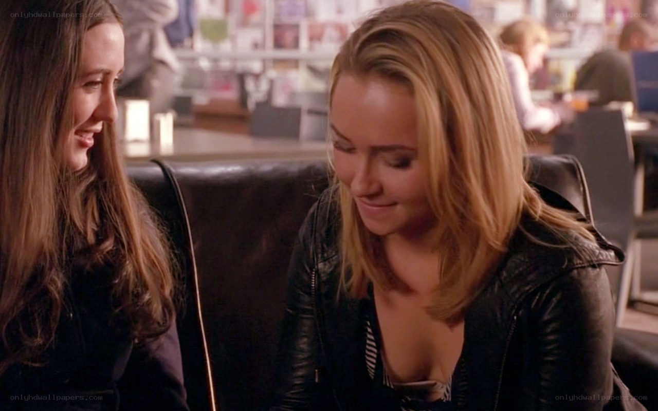 Two women talking in a cafe