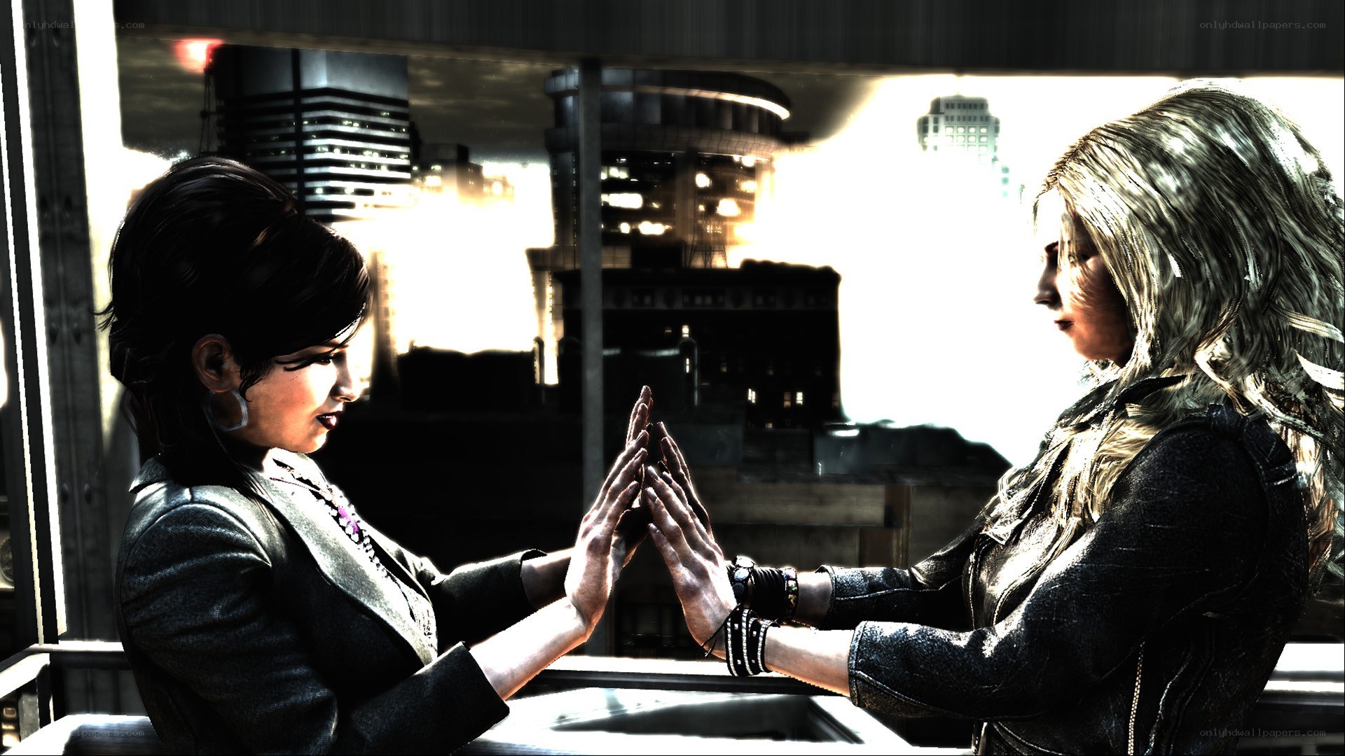 two women touching hands