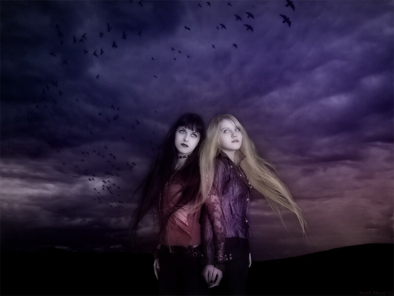 two women under a dark sky
