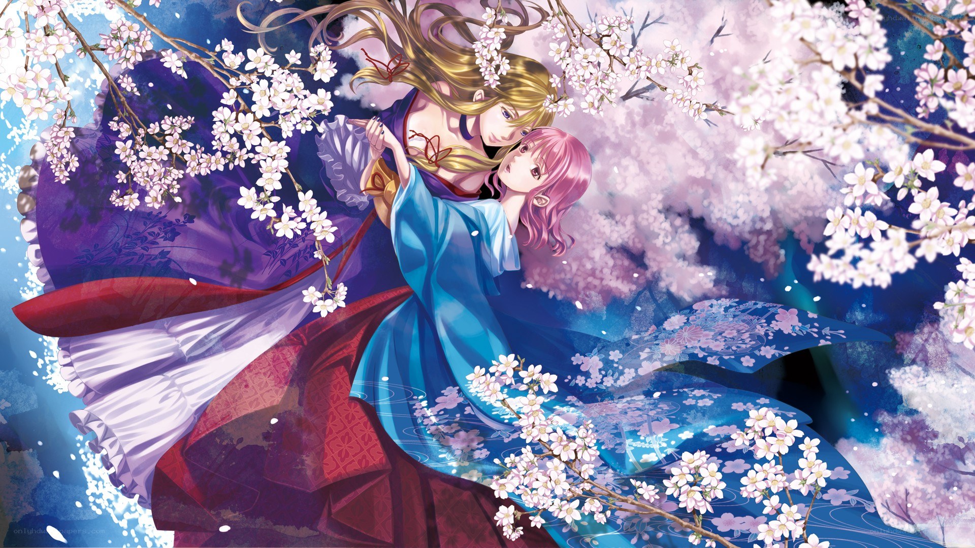Two women under cherry blossoms