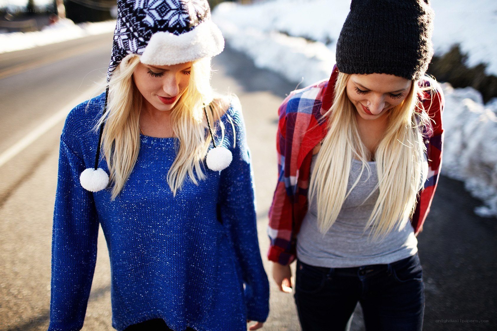 two women walking in winter