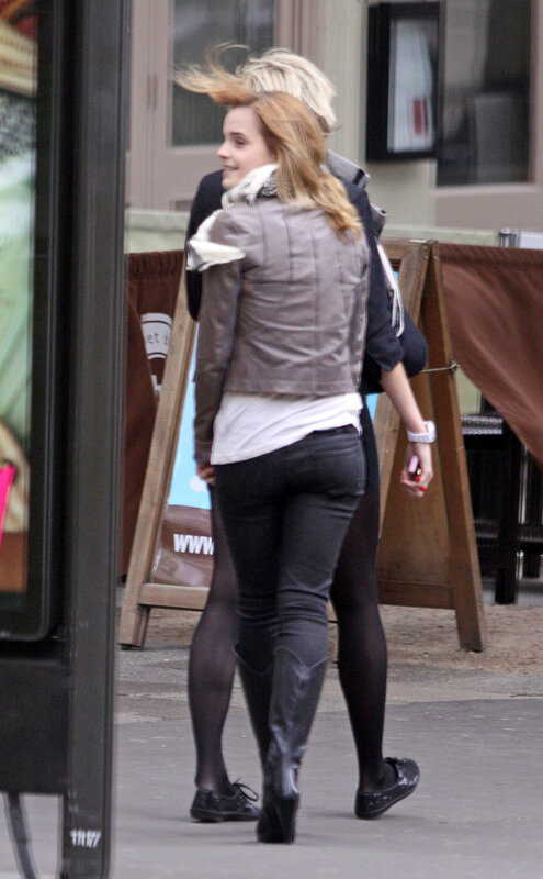 two women walking on street