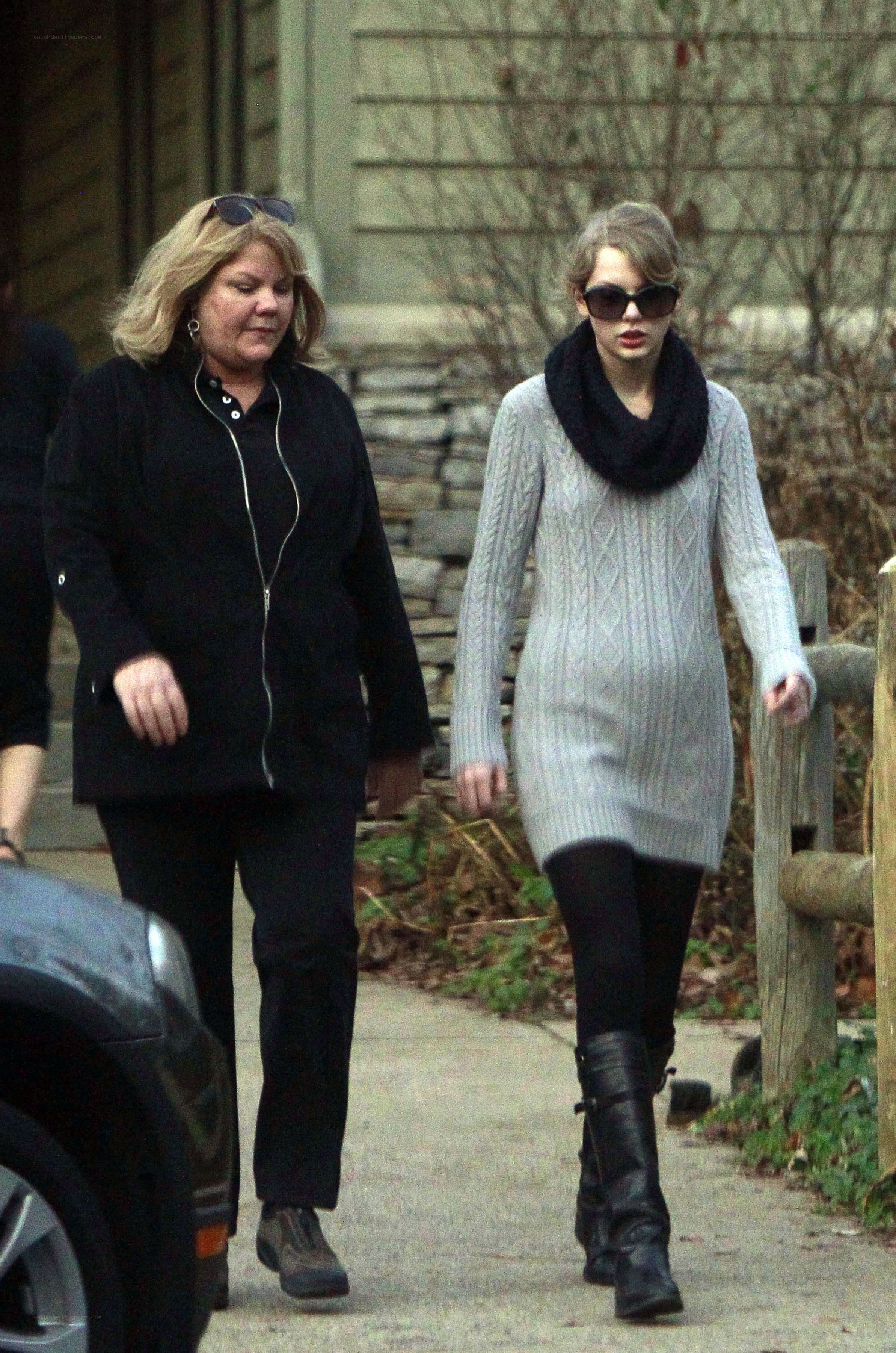 Two women walking outside