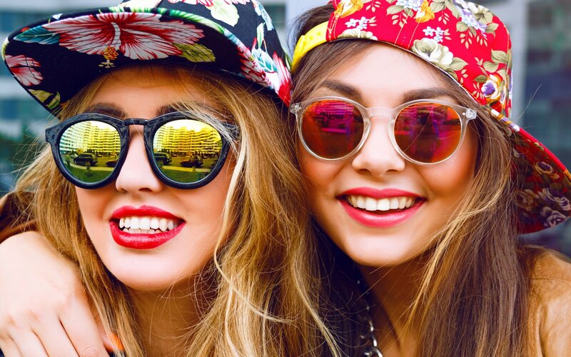 Two Women Wearing Hats
