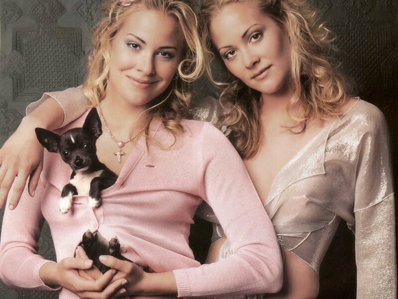 Two women with a puppy
