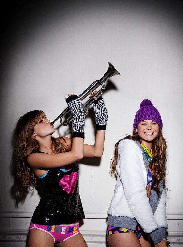 Two women with a trumpet