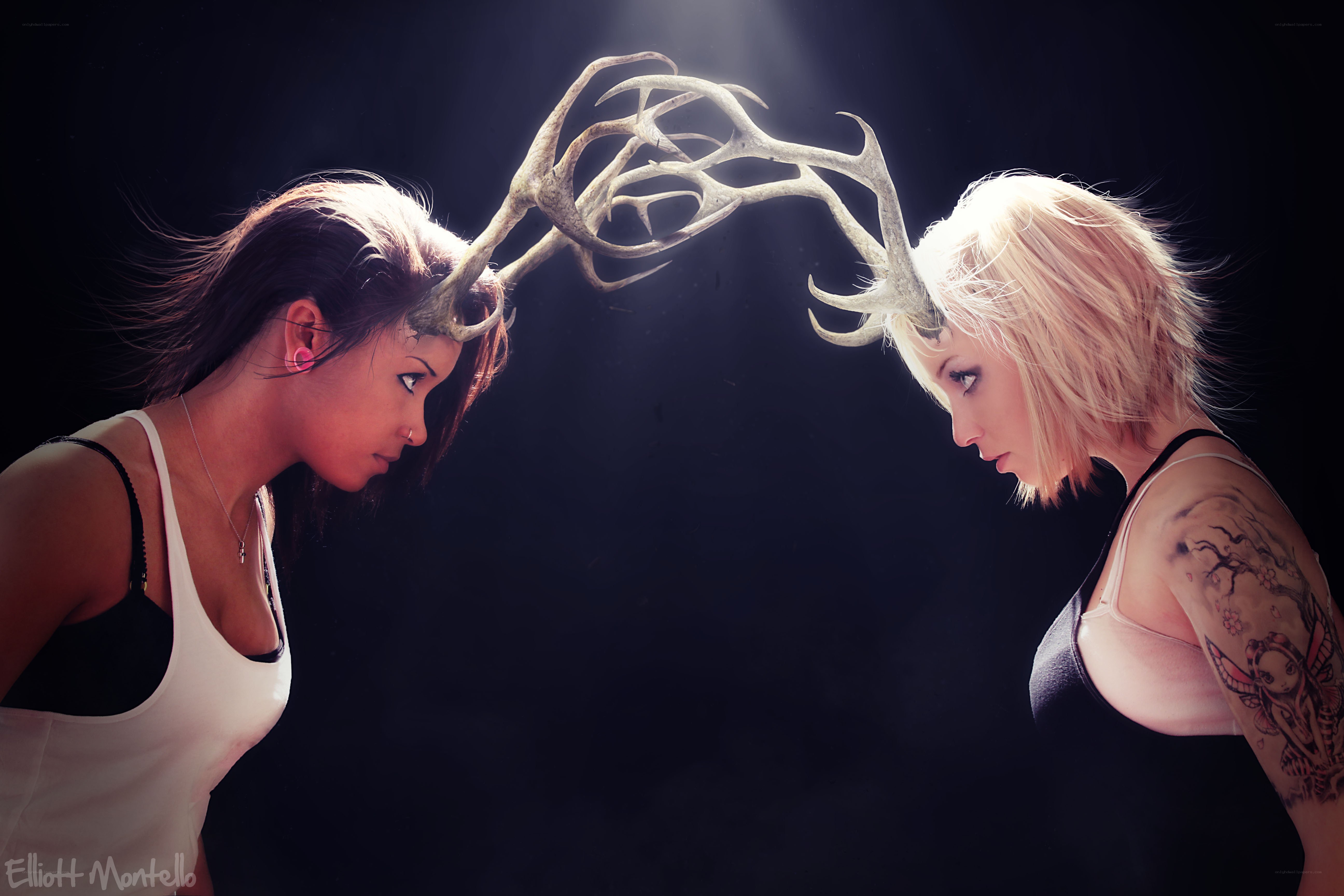two women with antlers