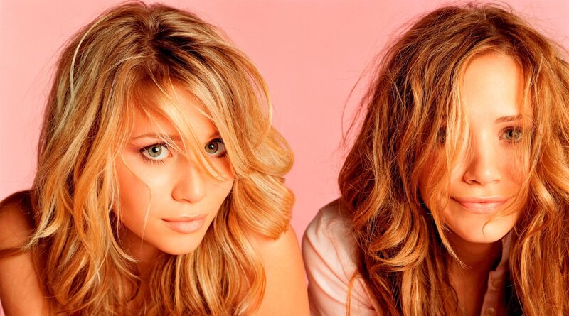 two women with blonde hair