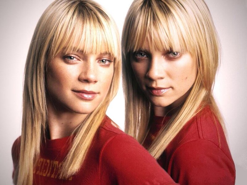 Two Women with Blonde Hair — Red