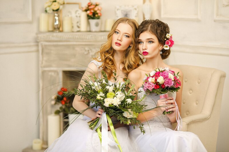 Two Women with Bouquets