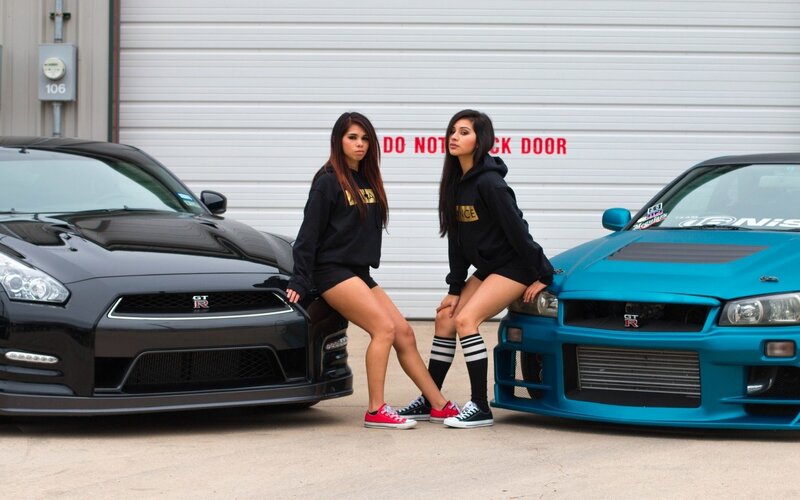 Two Women with Cars — Black, Confident