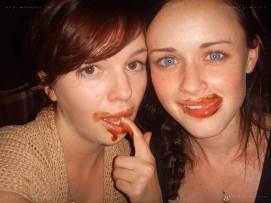 two women with chocolate on faces