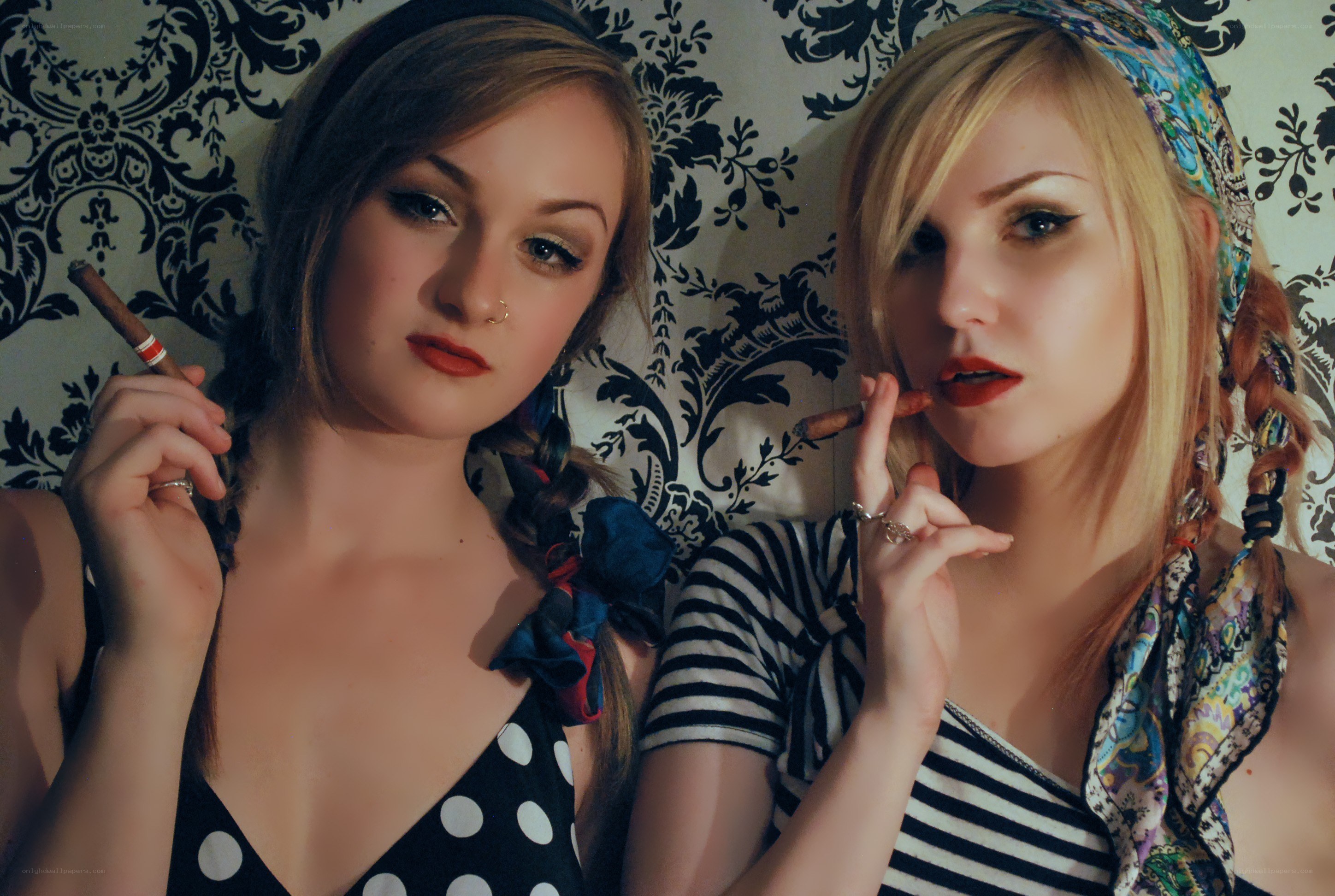 Two women with cigars
