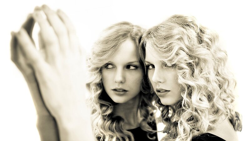 two women with curly hair