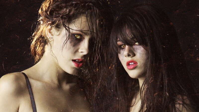 two women with dramatic makeup