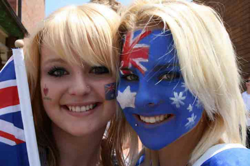Two Women with Face Paint — Blue