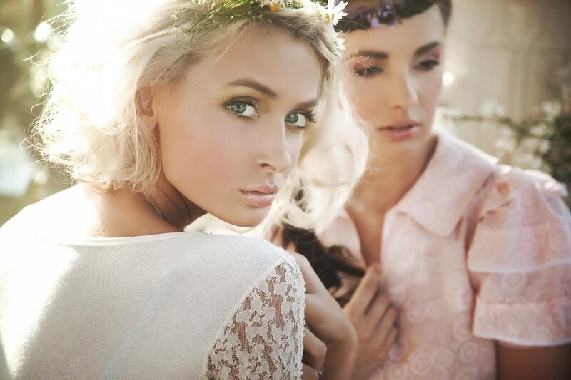 Two Women with Flower Crowns — White, Serene