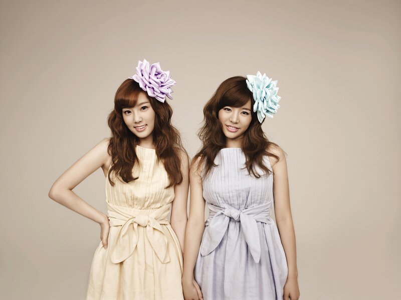 two women with flower headbands
