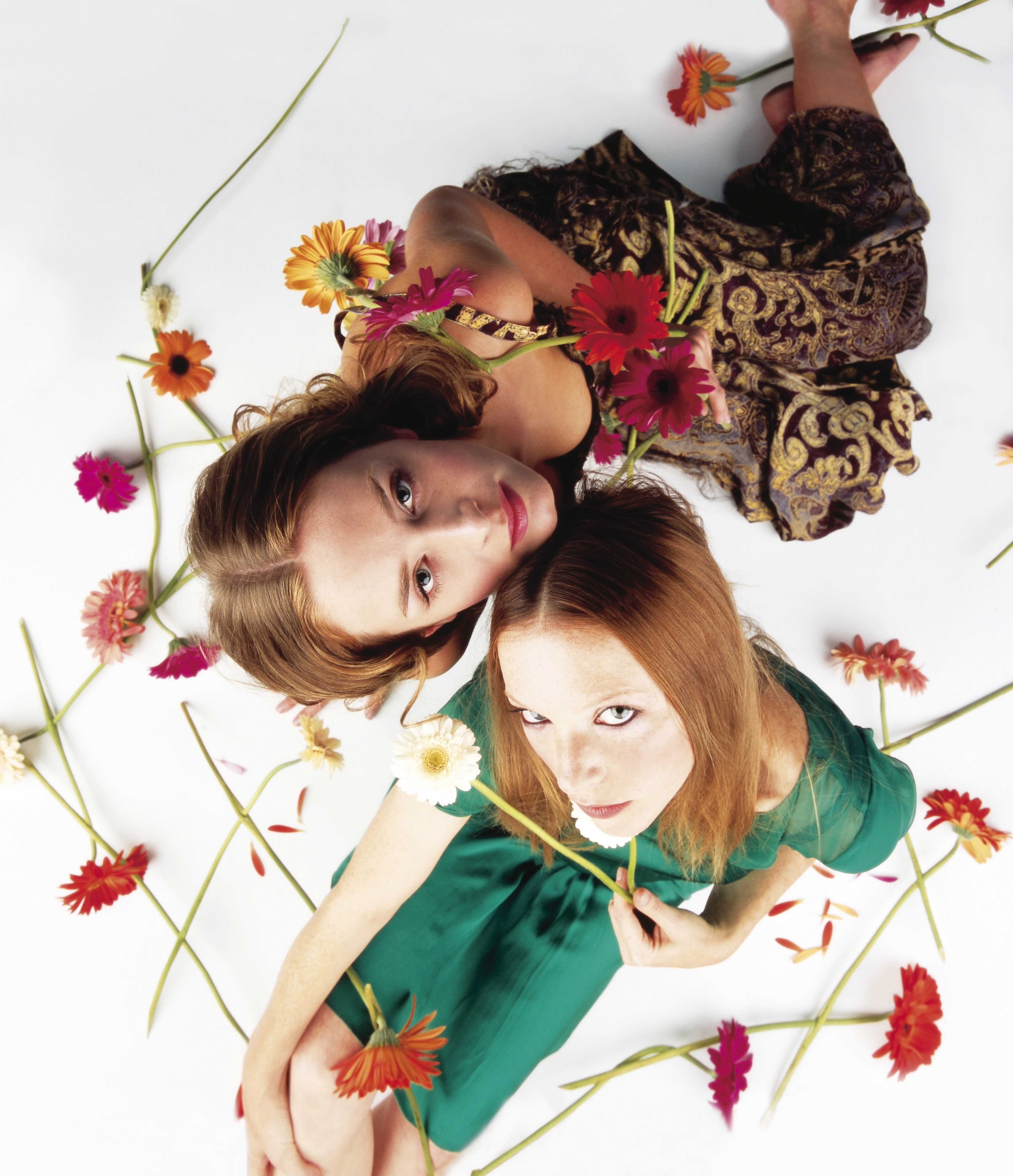 Two women with flowers