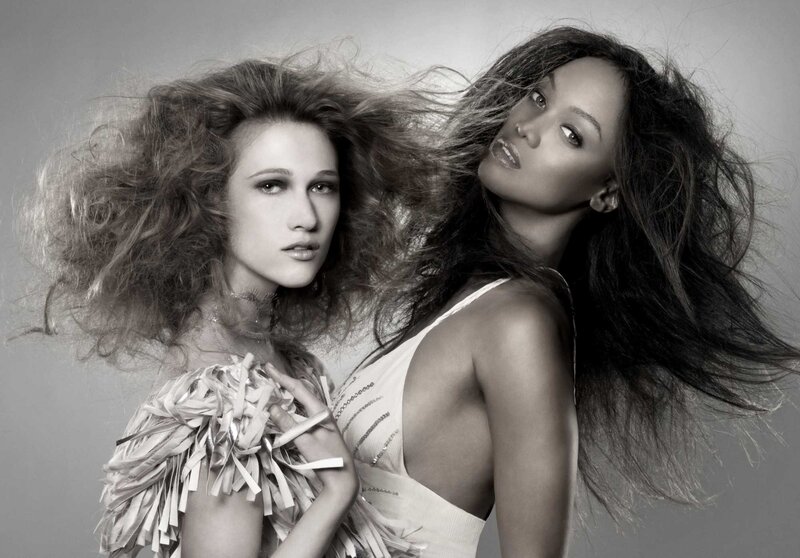 Two women with flowing hair
