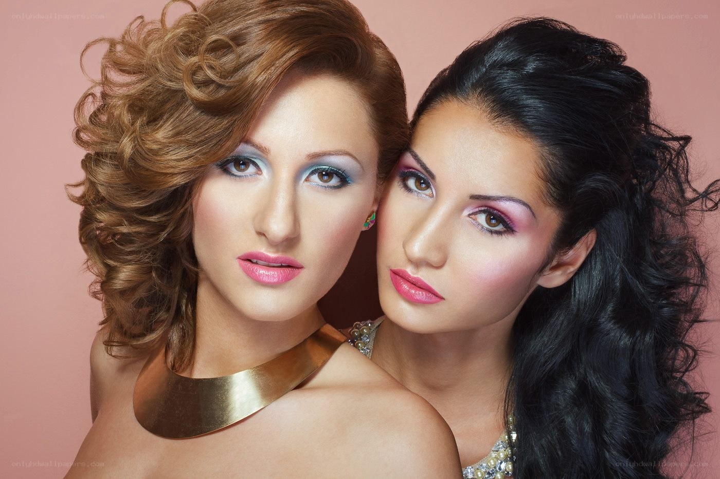 two women with glamorous makeup
