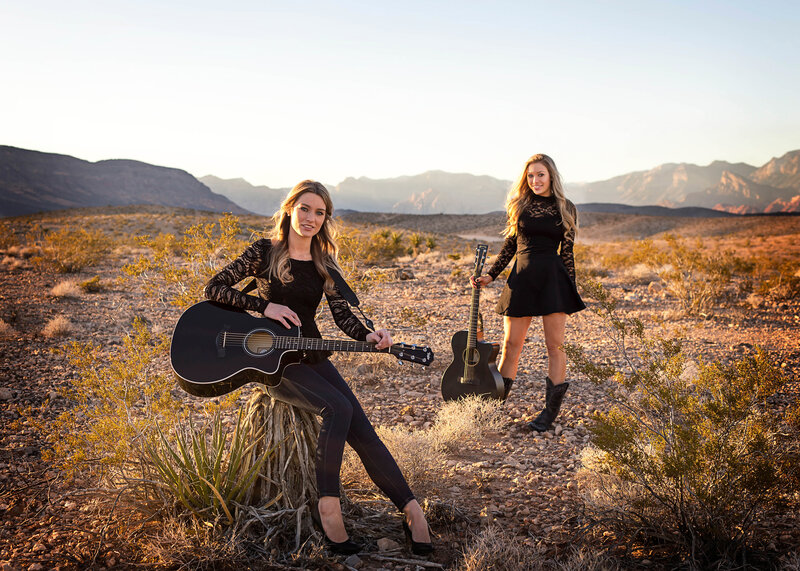 Two Women with Guitars — Black, Serene