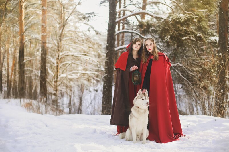 Two Women with Husky