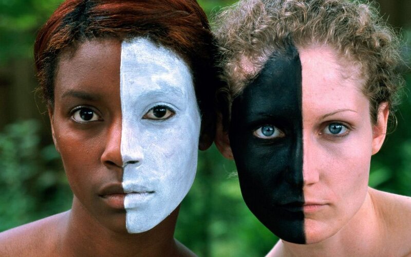 Two women with painted faces