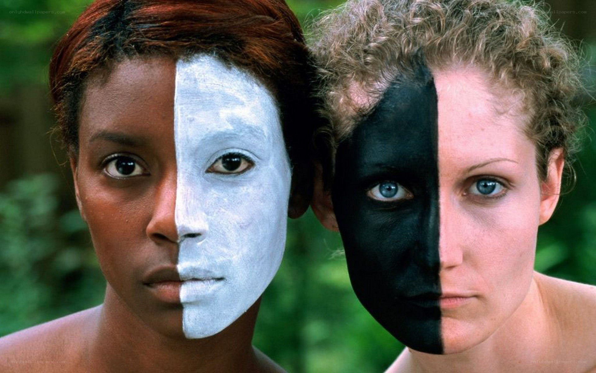 Two women with painted faces