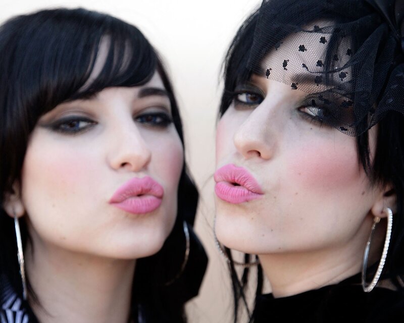 two women with pink lipstick