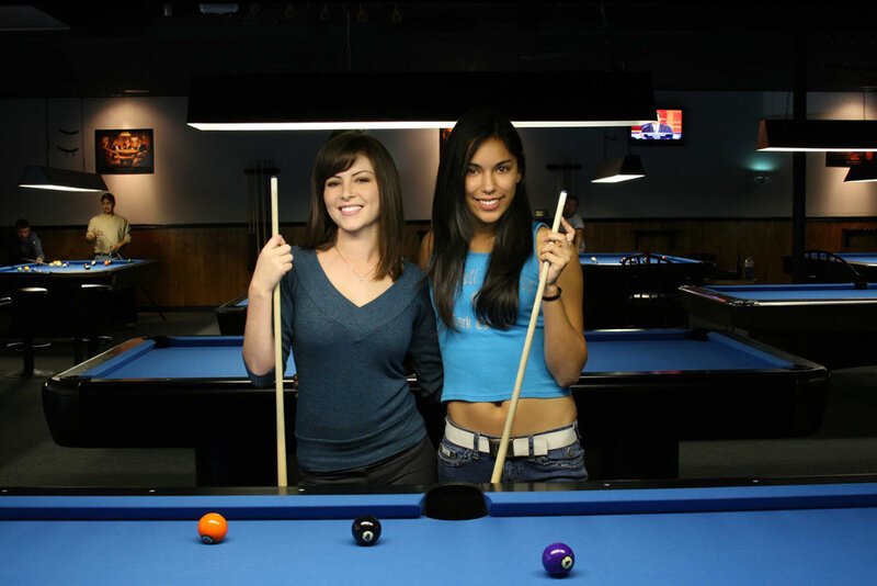 Two Women with Pool Cues — Blue