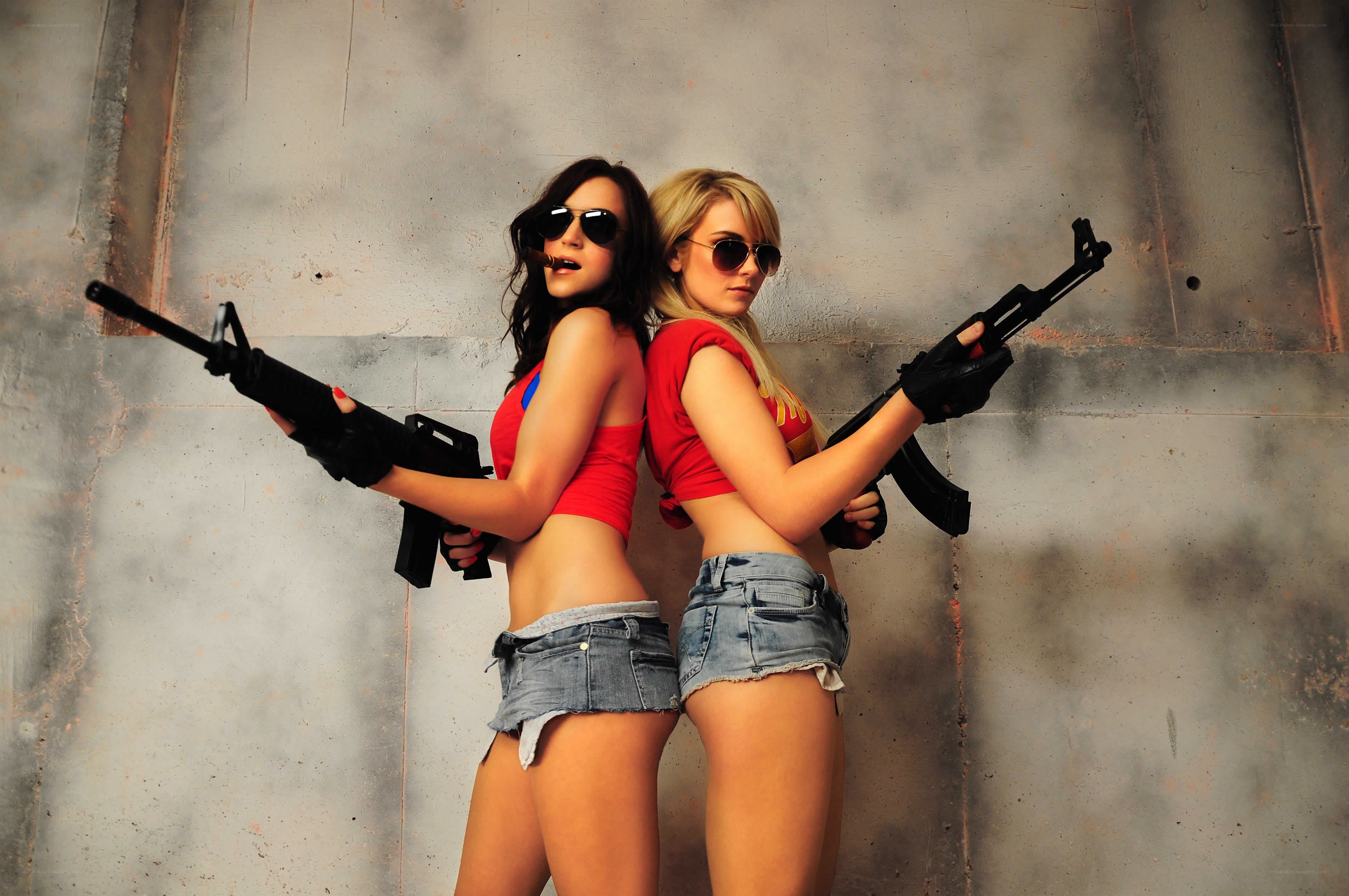two women with rifles