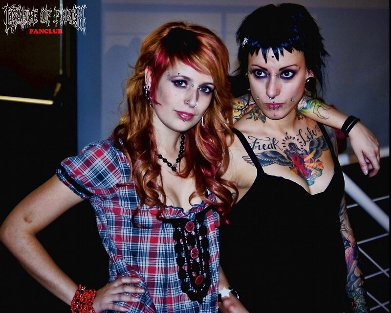 Two women with tattoos and piercings
