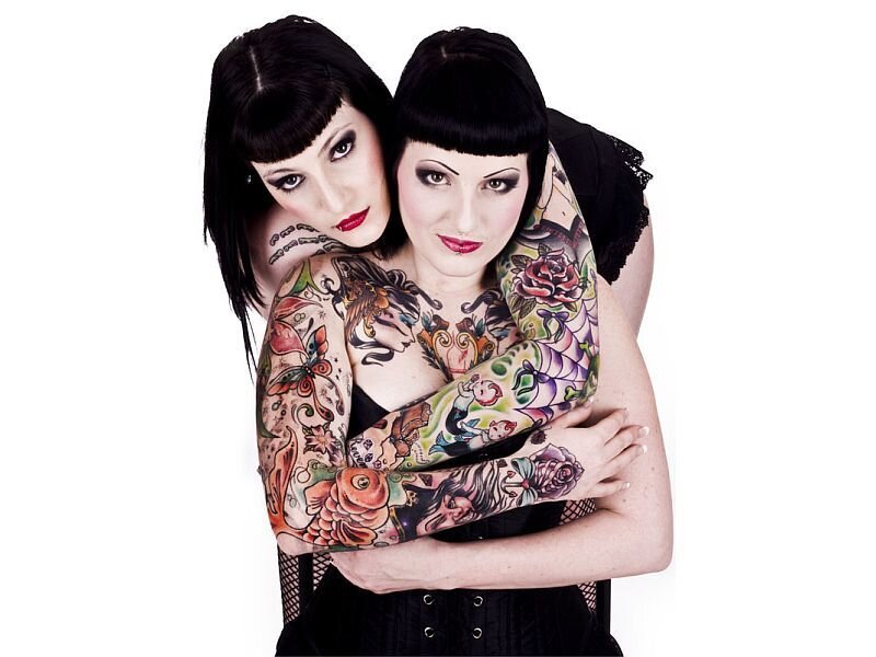 Two Women with Tattoos — Black, Dramatic