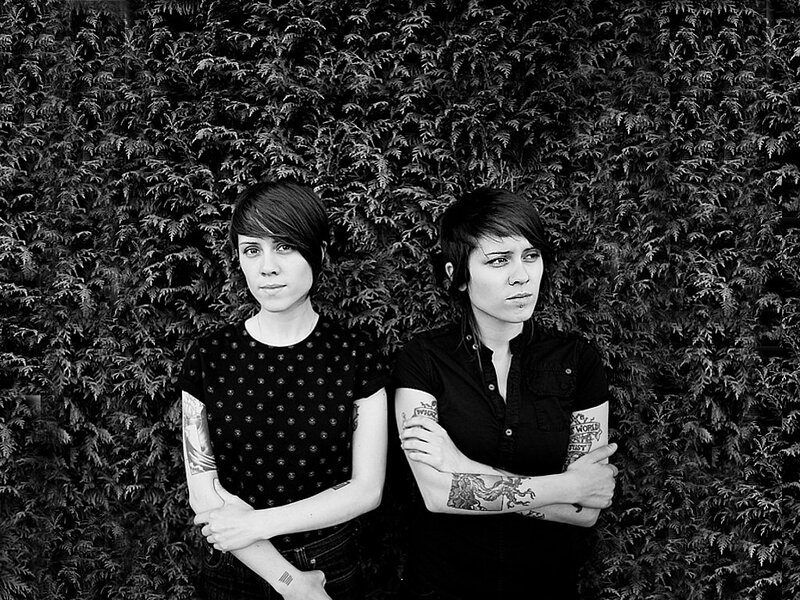 Two Women with Tattoos — Black, Serious