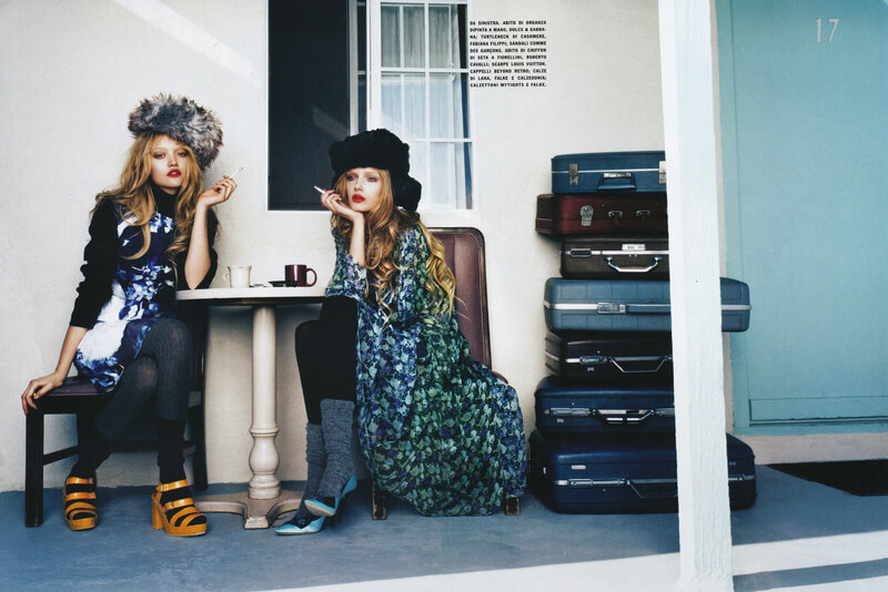 Two women with vintage luggage