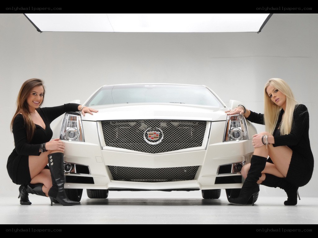 Two women with white Cadillac