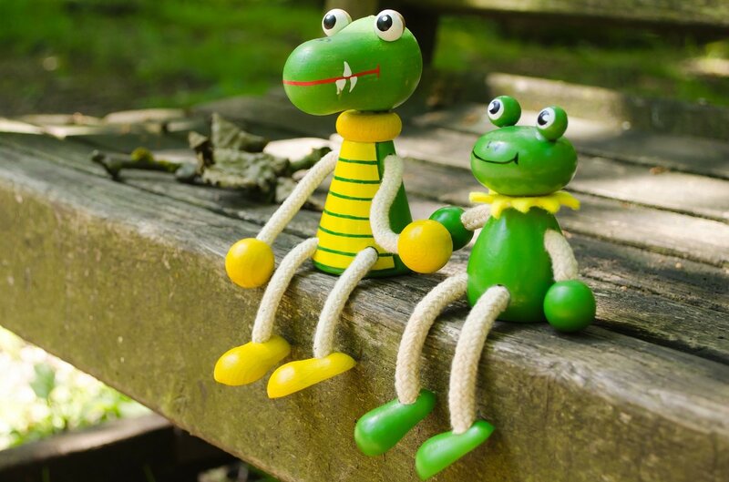 Two Wooden Frog Toys