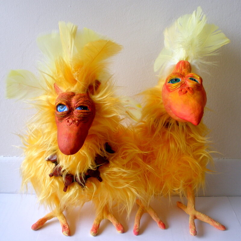 Two Yellow Bird Sculptures