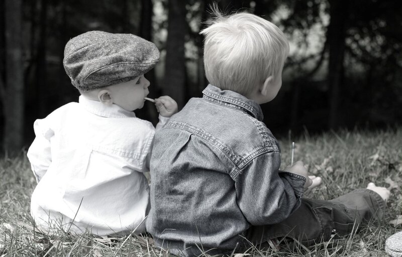 Two Young Boys Sitting