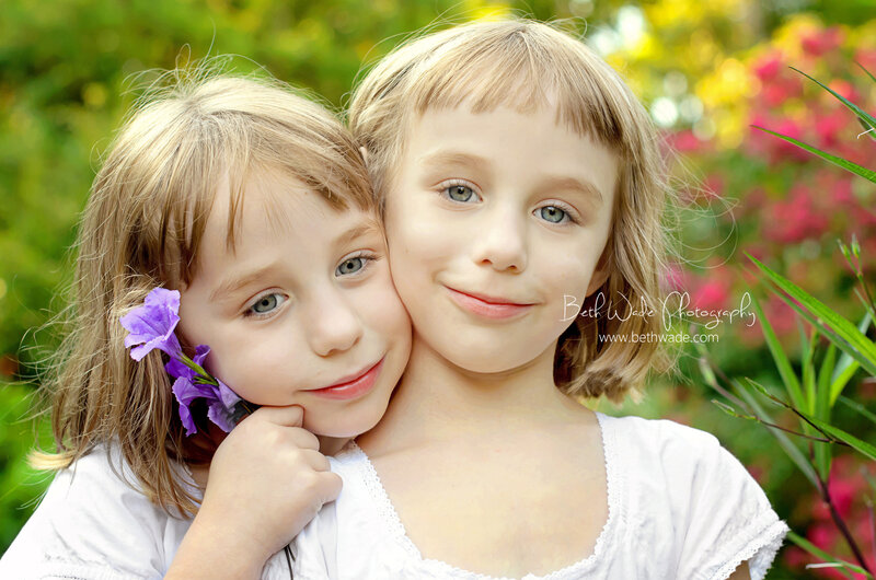 Two Young Girls Hugging — Purple