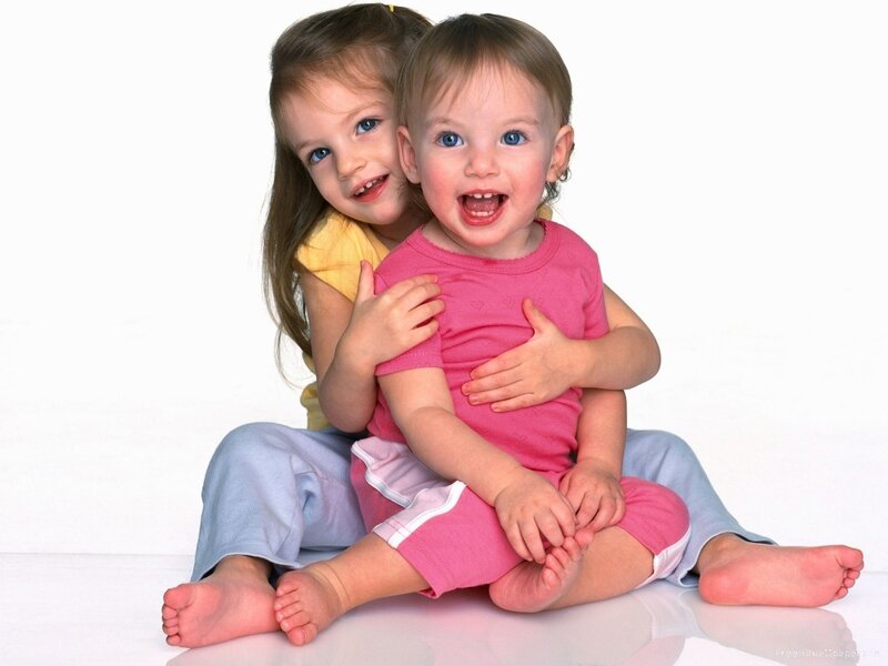 Two Young Girls Hugging