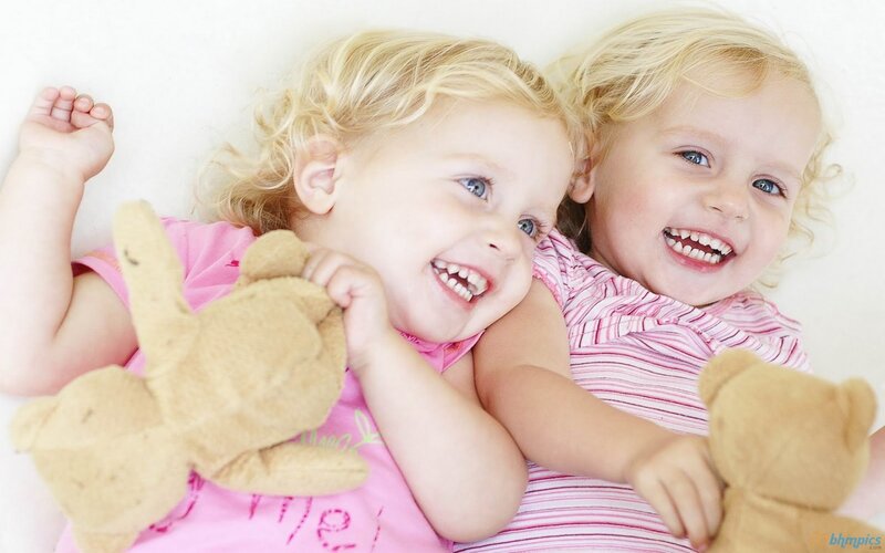 Two Young Girls Lying