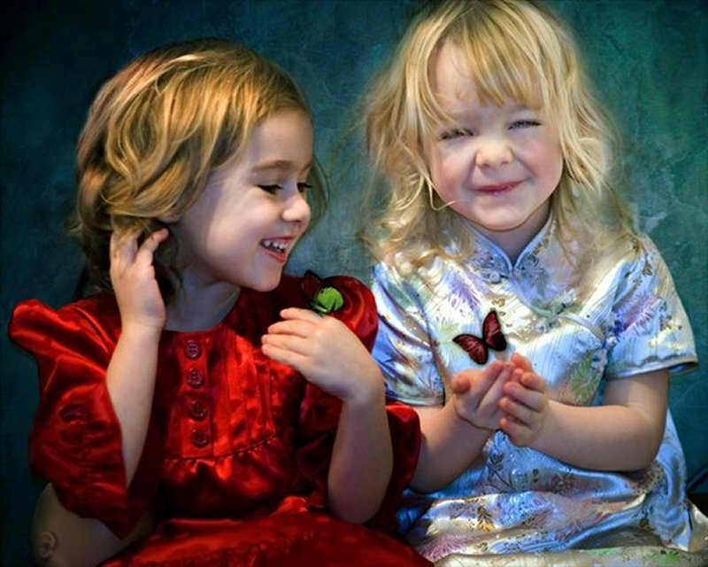 Two Young Girls Sitting