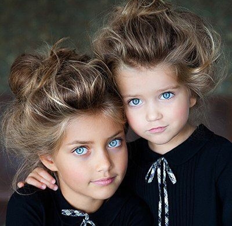 Two Young Girls with Blue Eyes